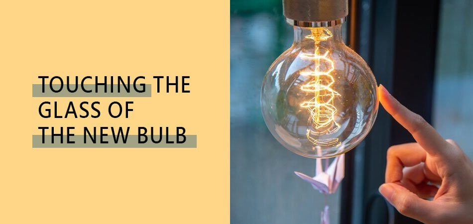 Touching-the-Glass-of-the-New-Bulb
